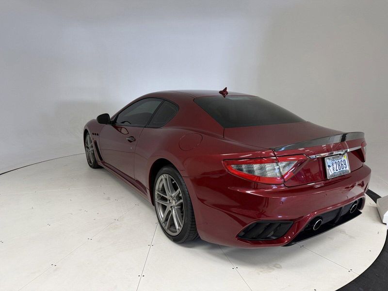 2018 Maserati GranTurismo MC in a Rosso Trionfale Metallic exterior color and Bianco Pregiatointerior. Karma Newport Beach (844) 527-6262 karmanb.com 