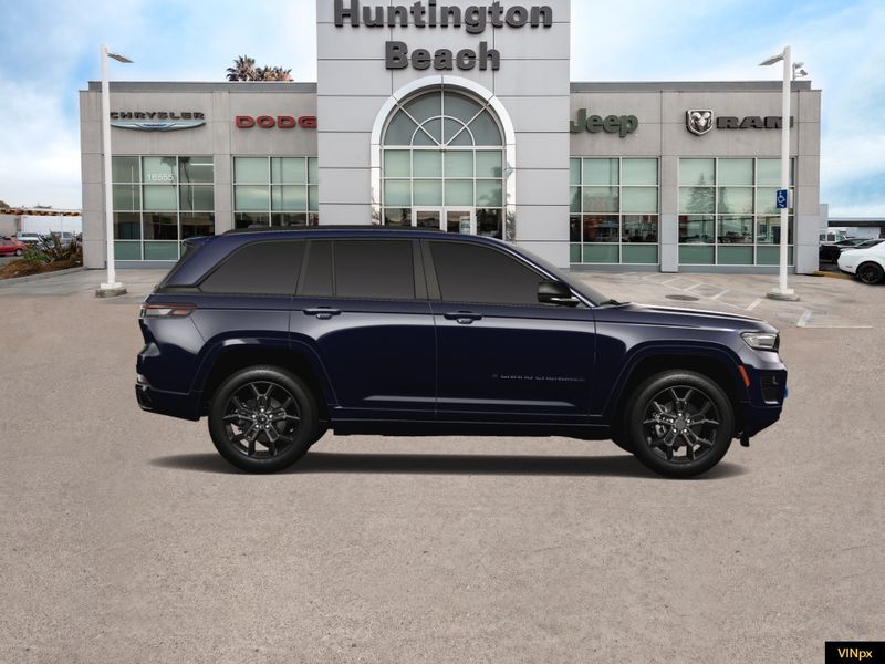 2023 Jeep Grand Cherokee 4xe Base 30th Anniversary 4x4 in a Midnight Sky exterior color and Global Blackinterior. BEACH BLVD OF CARS beachblvdofcars.com 