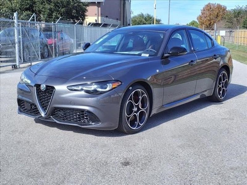 2024 Alfa Romeo Giulia Ti in a Vesuvio Gray Metallic exterior color and Blackinterior. Northside Imports Houston 281-475-4549 northsideimportshouston.com 