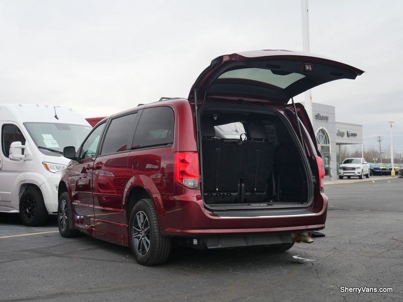 2017 Dodge Grand Caravan GT in a Octane Red Pearl Coat exterior color and Blackinterior. Paul Sherry Chrysler Dodge Jeep RAM (937) 749-7061 sherrychrysler.net 