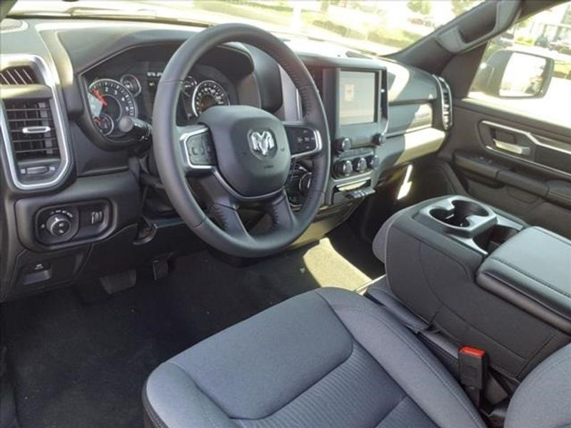 2024 RAM 1500 Big Horn Lone Star in a Diamond Black Crystal Pearl Coat exterior color and Blackinterior. Perris Valley Auto Center 951-657-6100 perrisvalleyautocenter.com 