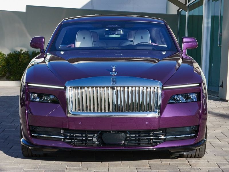 2024 Rolls-Royce Spectre  in a Twilight Purple exterior color and Arctic Whiteinterior. SHELLY AUTOMOTIVE shellyautomotive.com 