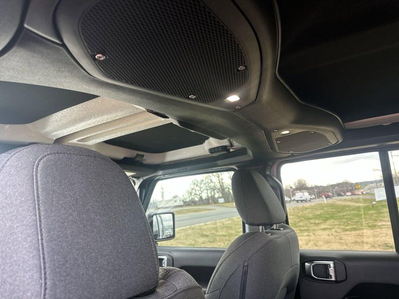 2024 Jeep Wrangler 4-door Sport S in a Silver Zynith Clear Coat exterior color and Blackinterior. Gupton Motors Inc 615-384-2886 guptonmotors.com 