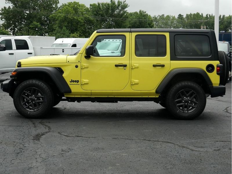 2024 Jeep Wrangler 4-door Sport S in a High Velocity Clear Coat exterior color and Blackinterior. Paul Sherry Chrysler Dodge Jeep RAM (937) 749-7061 sherrychrysler.net 