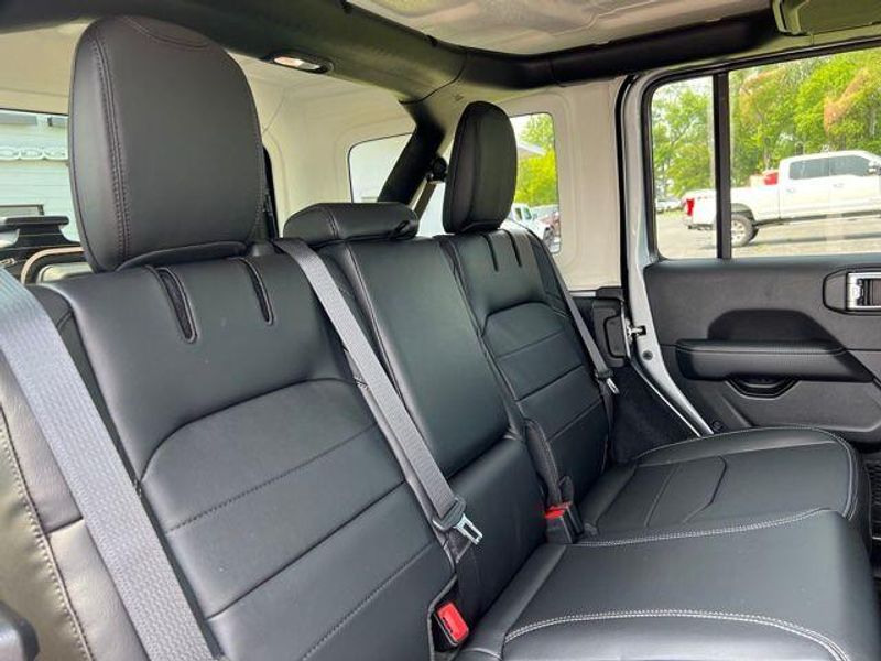 2023 Jeep Wrangler Sahara 4xe in a Silver Zynith Clear Coat exterior color and Blackinterior. Lakeshore CDJR Seaford 302-213-6058 lakeshorecdjr.com 