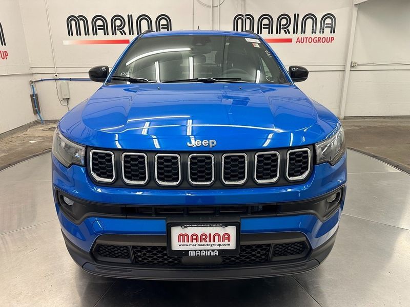 2024 Jeep Compass Latitude 4x4 in a Laser Blue Pearl Coat exterior color. Marina Auto Group (855) 564-8688 marinaautogroup.com 