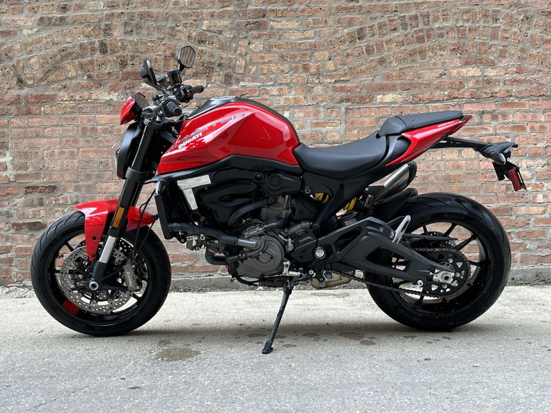 2021 Ducati Monster Plus   in a red exterior color. Motoworks Chicago 312-738-4269 motoworkschicago.com 