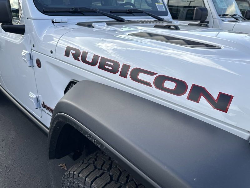 2024 Jeep Gladiator Rubicon 4x4 in a Bright White Clear Coat exterior color. Gupton Motors Inc 615-384-2886 guptonmotors.com 