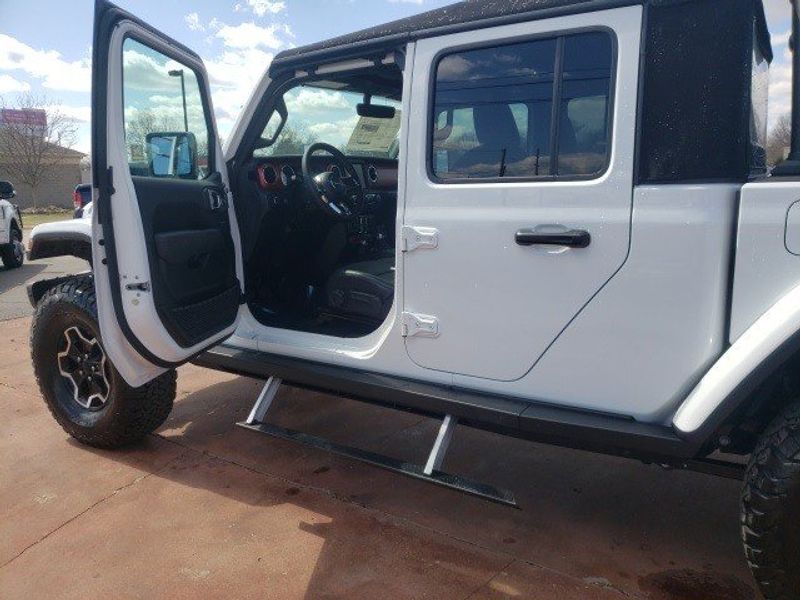 2023 Jeep Gladiator Rubicon 4x4 in a Bright White Clear Coat exterior color and Blackinterior. Matthews Chrysler Dodge Jeep Ram 918-276-8729 cyclespecialties.com 