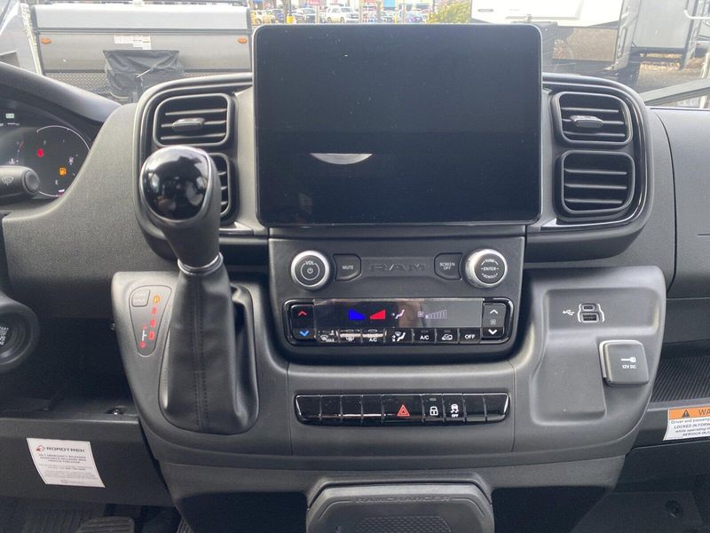 2024 ROADTREK Pivot  in a Silver Metallic exterior color and Chestnut Browninterior. Legacy Powersports 541-663-1111 legacypowersports.net 