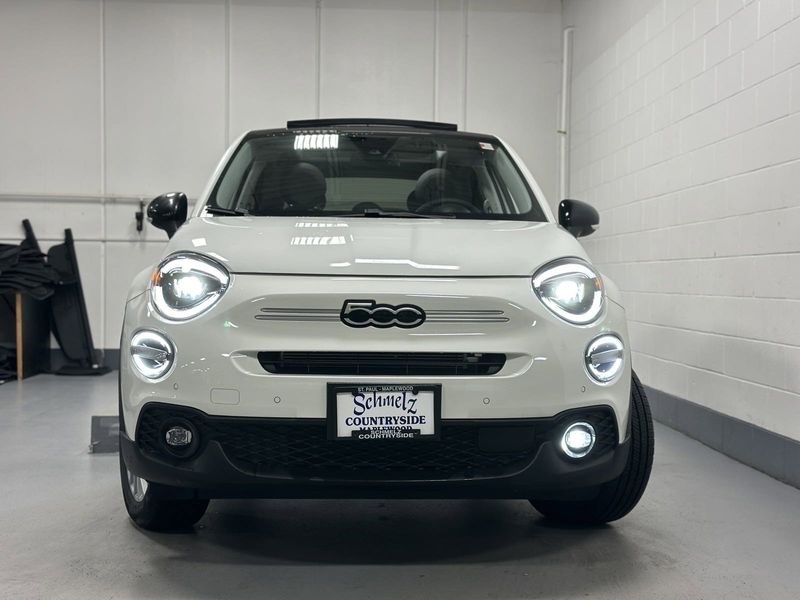 2023 Fiat 500x Pop Awd in a Bianco Gelato (White Clear Coat) exterior color and Blackinterior. Schmelz Countryside Alfa Romeo and Fiat (651) 968-0556 schmelzfiat.com 