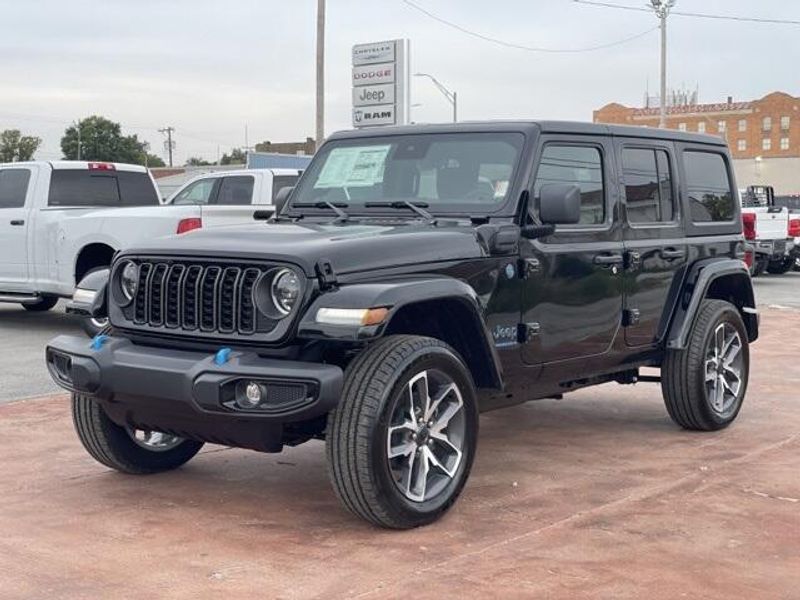 2024 Jeep Wrangler 4-door Sport S 4xe in a Black Clear Coat exterior color and Blackinterior. Matthews Chrysler Dodge Jeep Ram 918-276-8729 cyclespecialties.com 