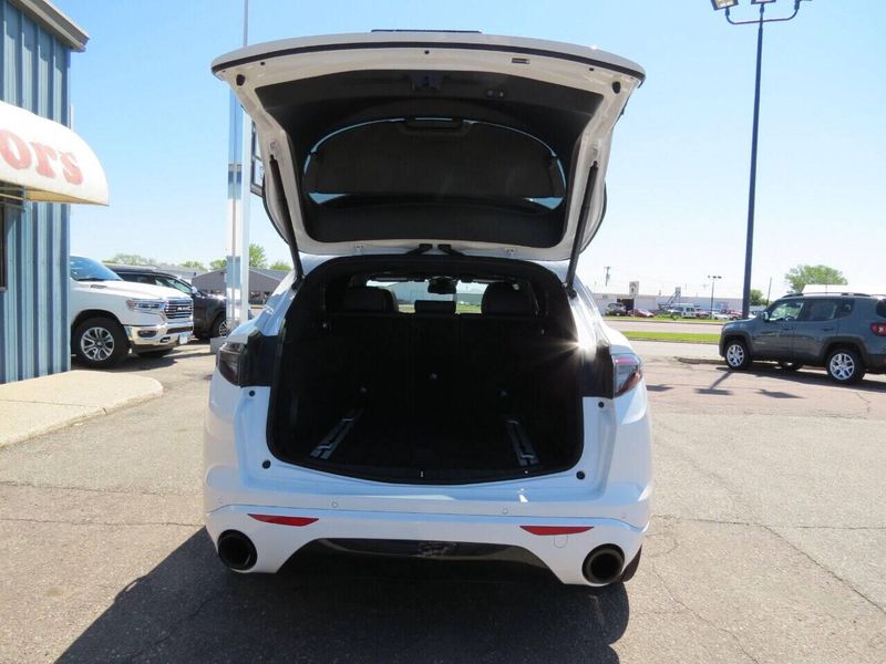 2021 Alfa Romeo Stelvio Ti Sport AWD 4dr Crossover in a White exterior color and Blackinterior. Militello Motors ​507-200-4344 militellomotors.net 