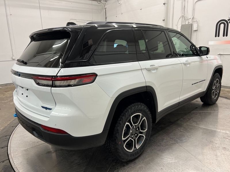2023 Jeep Grand Cherokee Trailhawk 4xe in a Bright White Clear Coat exterior color and Global Blackinterior. Marina Auto Group (855) 564-8688 marinaautogroup.com 