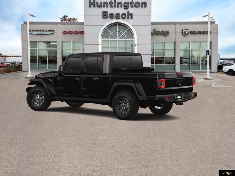2024 Jeep Gladiator Willys 4x4 in a Black Clear Coat exterior color and Black Cloth LOW-Back BUCinterior. BEACH BLVD OF CARS beachblvdofcars.com 