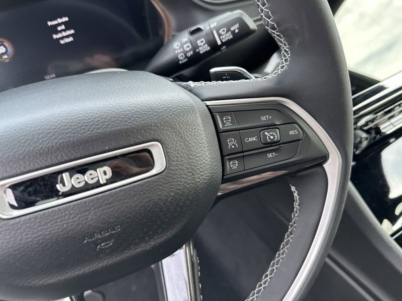 2023 Jeep Grand Cherokee Altitude 4x4 in a Bright White Clear Coat exterior color and Global Blackinterior. Gupton Motors Inc 615-384-2886 guptonmotors.com 
