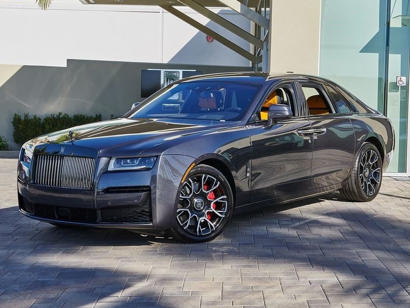 2024 Rolls-Royce Ghost  in a Gunmetal exterior color and Forge Yellowinterior. SHELLY AUTOMOTIVE shellyautomotive.com 