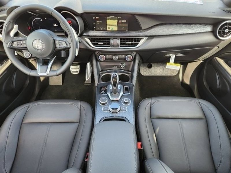 2024 Alfa Romeo Stelvio Sprint in a Vesuvio Gray Metallic exterior color and Blackinterior. Northside Imports Houston 281-475-4549 northsideimportshouston.com 