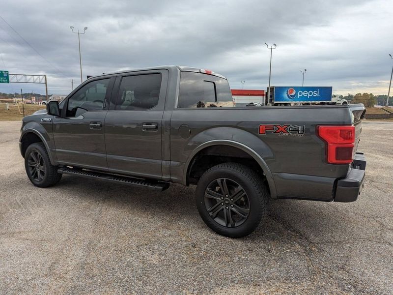 2020 Ford F-150 Lariat in a Magnetic Metallic exterior color and Blackinterior. Johnson Dodge 601-693-6343 pixelmotiondemo.com 