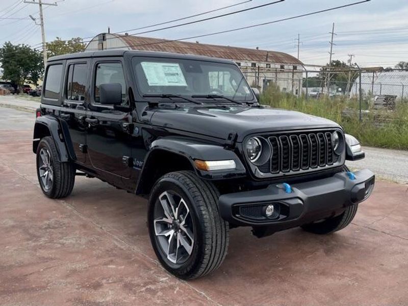 2024 Jeep Wrangler 4-door Sport S 4xe in a Black Clear Coat exterior color and Blackinterior. Matthews Chrysler Dodge Jeep Ram 918-276-8729 cyclespecialties.com 