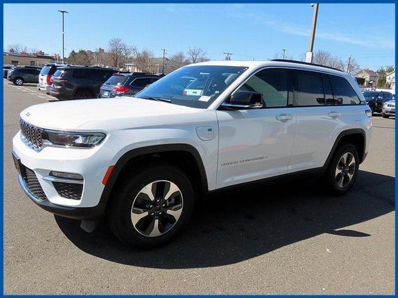 2024 Jeep Grand Cherokee 4xe Base 4xe in a Bright White Clear Coat exterior color and Global Blackinterior. Papas Jeep Ram In New Britain, CT 860-356-0523 papasjeepram.com 