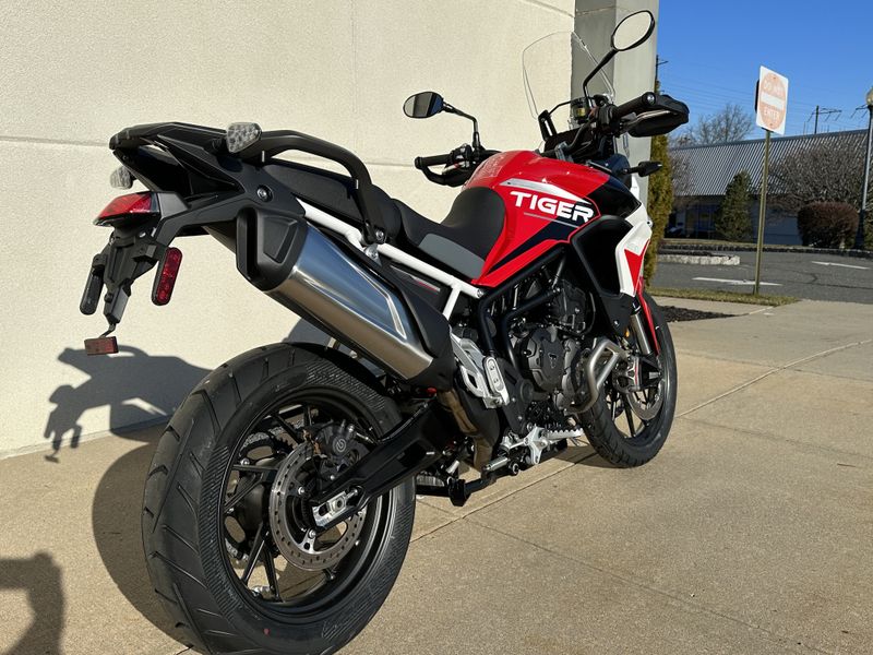 2024 Triumph TIGER 900 GT ARAGON EDITION in a DIABLO RED / PHANTOM BLACK exterior color. Cross Country Powersports 732-491-2900 crosscountrypowersports.com 