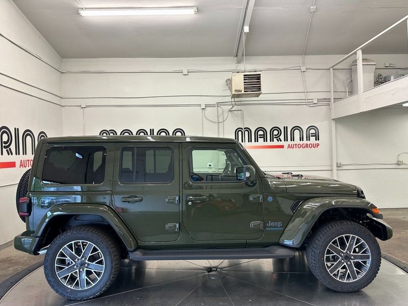 2024 Jeep Wrangler 4-door High Altitude 4xe in a Sarge Green Clear Coat exterior color and Green/Blackinterior. Marina Auto Group (855) 564-8688 marinaautogroup.com 