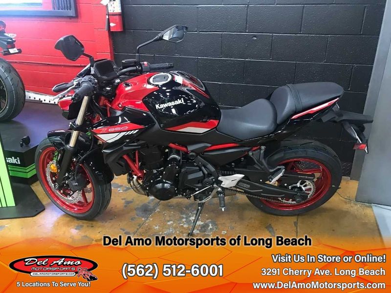 2024 Kawasaki ER650NRFAL-RD1  in a CANDY PERSIMMON RED/EBONY exterior color. Del Amo Motorsports of Long Beach (562) 362-3160 delamomotorsports.com 