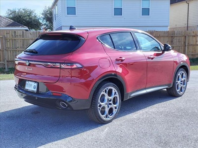 2024 Alfa Romeo Tonale Veloce in a Alfa Rosso exterior color and Red/Blackinterior. Northside Imports Houston 281-475-4549 northsideimportshouston.com 