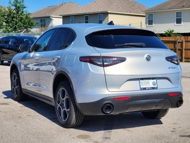 2024 Alfa Romeo Stelvio Sprint in a Moonlight Gray Metallic exterior color and Blackinterior. Northside Imports Houston 281-475-4549 northsideimportshouston.com 