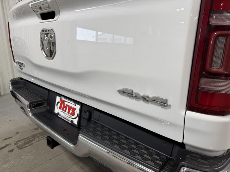 Used 2020 RAM 1500 Laramie in a Bright White Clear Coat exterior color and Blackinterior. Thys Motor Company 319-318-6640 thysmotorco.com 