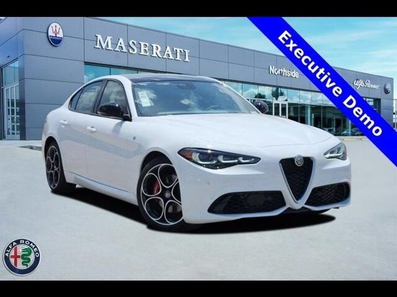 2024 Alfa Romeo Giulia Ti in a Alfa White exterior color and Saddle Browninterior. Northside Imports Houston 281-475-4549 northsideimportshouston.com 