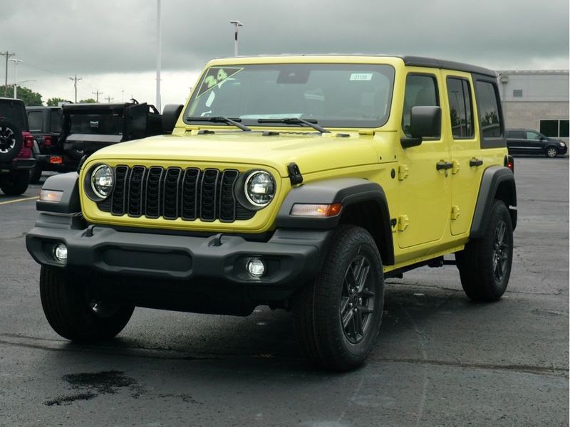 2024 Jeep Wrangler 4-door Sport S in a High Velocity Clear Coat exterior color and Blackinterior. Paul Sherry Chrysler Dodge Jeep RAM (937) 749-7061 sherrychrysler.net 