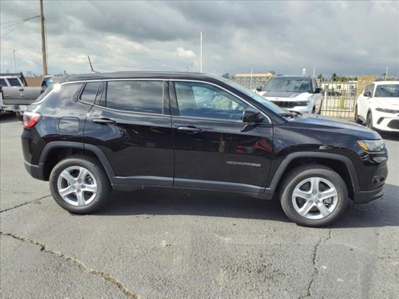 2024 Jeep Compass Sport in a Diamond Black Crystal Pearl Coat exterior color and Blackinterior. Perris Valley Auto Center 951-657-6100 perrisvalleyautocenter.com 