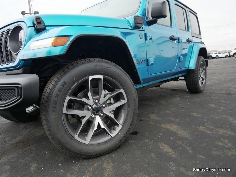 2024 Jeep Wrangler 4-door Sport S 4xe in a Bikini Pearl Coat exterior color and Blackinterior. Paul Sherry Chrysler Dodge Jeep RAM (937) 749-7061 sherrychrysler.net 