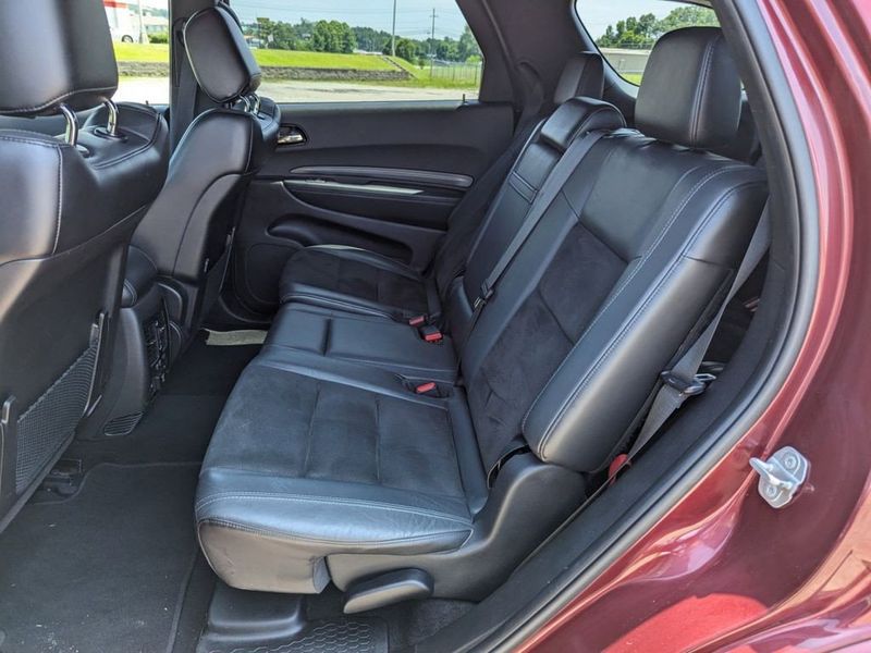 2021 Dodge Durango GT Plus in a Octane Red Pearl Coat exterior color and Blackinterior. Johnson Dodge 601-693-6343 pixelmotiondemo.com 