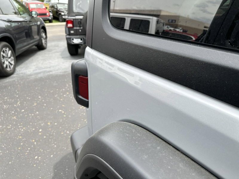 2024 Jeep Wrangler 4-door Willys in a Silver Zynith Clear Coat exterior color and Blackinterior. Gupton Motors Inc 615-384-2886 guptonmotors.com 