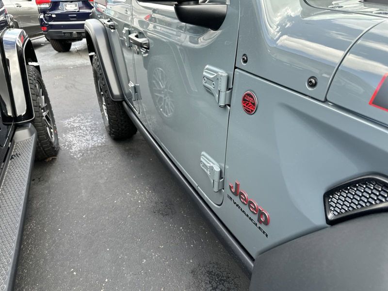 2024 Jeep Wrangler 4-door Rubicon in a Anvil Clear Coat exterior color. Gupton Motors Inc 615-384-2886 guptonmotors.com 