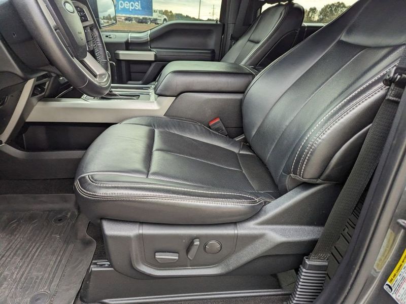 2020 Ford F-150 Lariat in a Magnetic Metallic exterior color and Blackinterior. Johnson Dodge 601-693-6343 pixelmotiondemo.com 