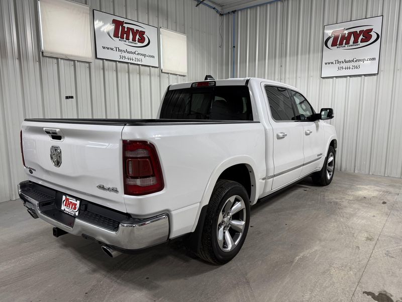 Used 2020 RAM 1500 Limited in a Ivory White Tri Coat Pearl Coat exterior color and Blackinterior. Thys Motor Company 319-318-6640 thysmotorco.com 