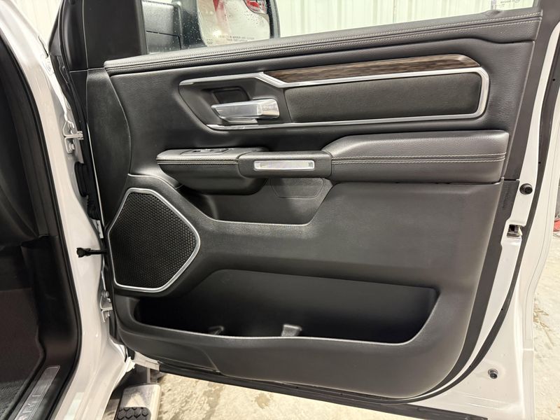 Used 2020 RAM 1500 Laramie in a Bright White Clear Coat exterior color and Blackinterior. Thys Motor Company 319-318-6640 thysmotorco.com 