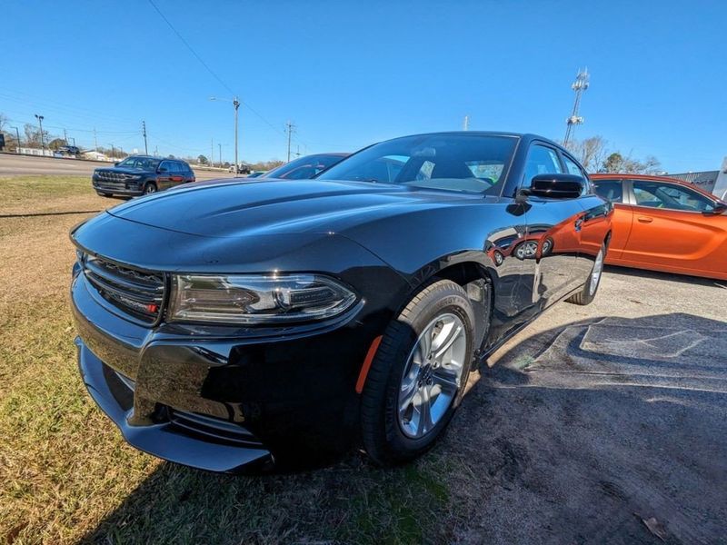 2023 Dodge Charger SXT Rwd in a Pitch Black exterior color and Blackinterior. Johnson Dodge 601-693-6343 pixelmotiondemo.com 