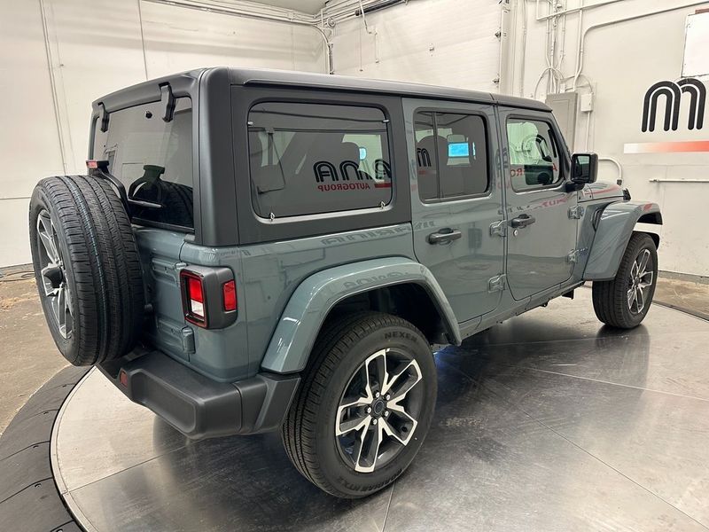 2024 Jeep Wrangler 4-door Sport S 4xe in a Anvil Clear Coat exterior color and Blackinterior. Marina Chrysler Dodge Jeep RAM (855) 616-8084 marinadodgeny.com 