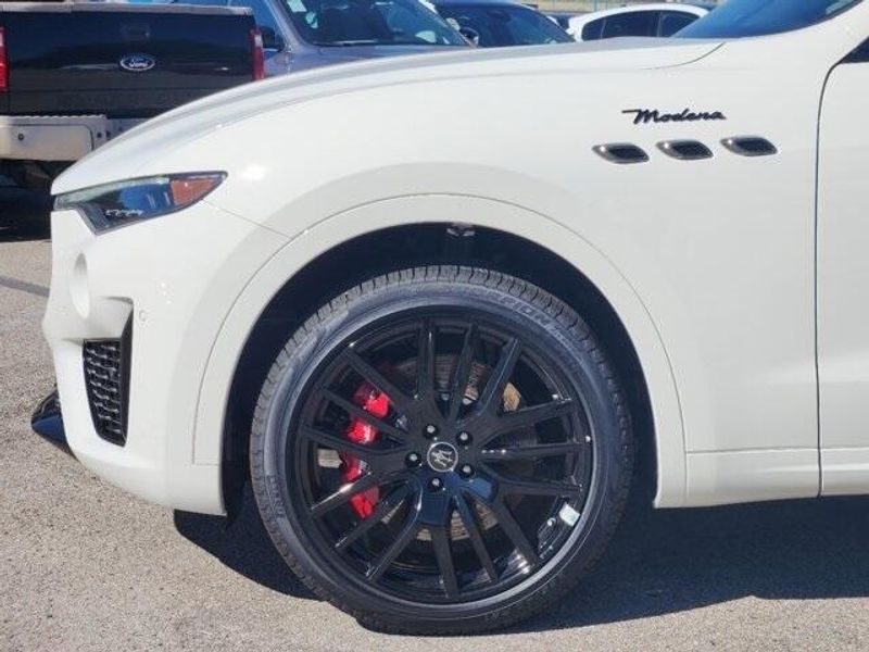 2024 Maserati Levante Modena in a White exterior color and Black/Redinterior. Northside Imports Houston 281-475-4549 northsideimportshouston.com 