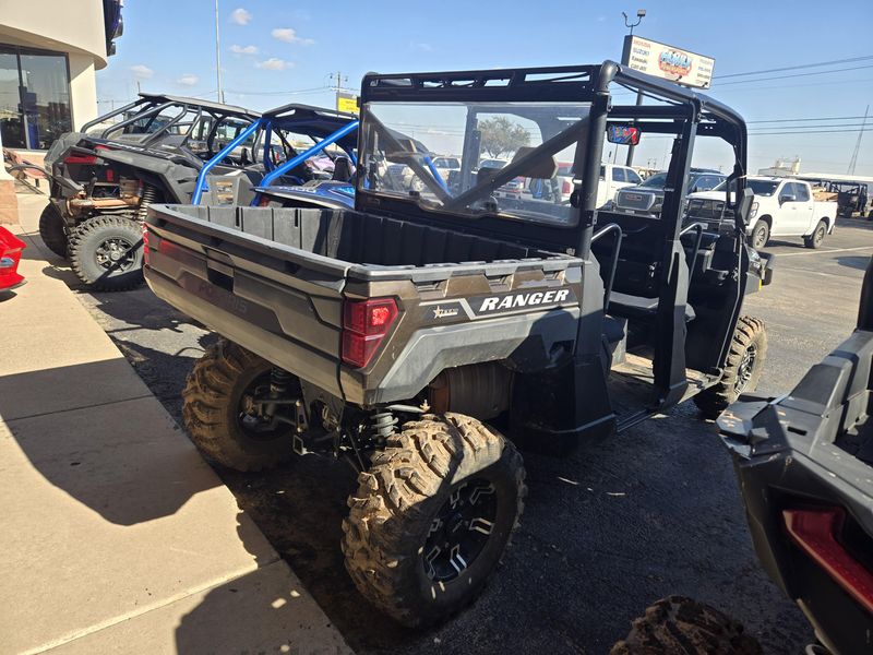 USED 2024 POLARIS RGR CREW XP 1000 TEXAS ED  BRONZE METALLIC TEXAS EDITION  Family PowerSports (877) 886-1997 familypowersports.com 