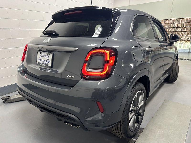 2023 Fiat 500x Sport Awd in a Grigio Moda (Graphite Gray Metallic) exterior color. Schmelz Countryside Alfa Romeo and Fiat (651) 968-0556 schmelzfiat.com 