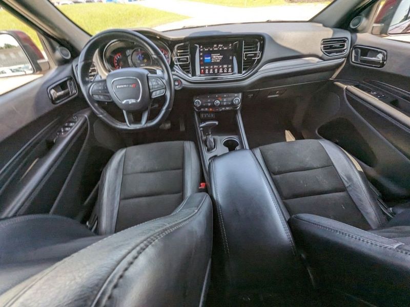 2021 Dodge Durango GT Plus in a Octane Red Pearl Coat exterior color and Blackinterior. Johnson Dodge 601-693-6343 pixelmotiondemo.com 