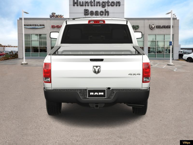 2023 RAM 1500 Classic Tradesman Crew Cab 4x4 in a Bright White exterior color and Blackinterior. BEACH BLVD OF CARS beachblvdofcars.com 