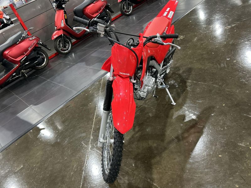 2025 Honda CRF125F BIG WHEEL  in a RED exterior color. Del Amo Motorsports of Redondo Beach (424) 390-7811 delamomotorsports.com 