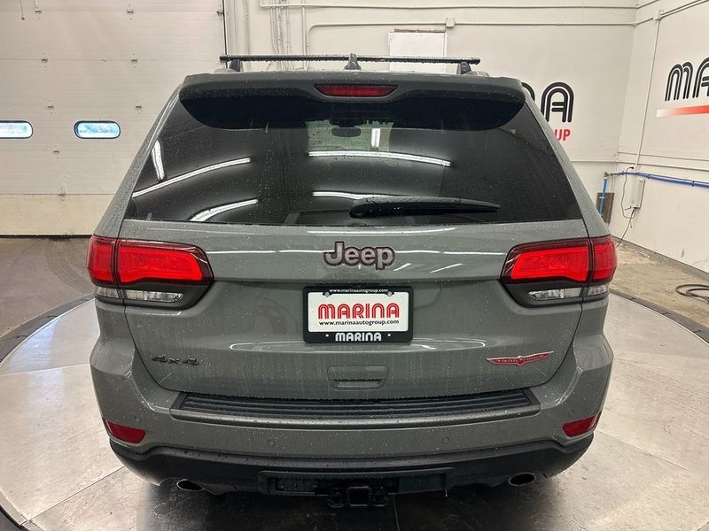 2021 Jeep Grand Cherokee Trailhawk in a Sting-Gray Clear Coat exterior color and Blackinterior. Marina Auto Group (855) 564-8688 marinaautogroup.com 